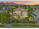 Stunning two-story home with mature landscaping, mountain views, and a grand entrance at 9616 Grand Isle Ln, Las Vegas, NV 89144