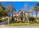 Beautiful home with manicured lawn, mature trees, and a grand entrance at 9616 Grand Isle Ln, Las Vegas, NV 89144