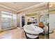 The spa-like bathroom includes a soaking tub, walk-in shower, and separate vanities at 9616 Grand Isle Ln, Las Vegas, NV 89144