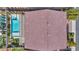 Aerial view of a home with a tile roof and sparkling pool at 9781 Arcadian Estate Ct, Las Vegas, NV 89141