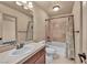 Cozy bathroom with neutral walls, tile flooring, and classic vanity at 9781 Arcadian Estate Ct, Las Vegas, NV 89141