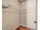 Organized closet with hanging racks and ample storage space for clothes at 9781 Arcadian Estate Ct, Las Vegas, NV 89141