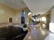 Grand foyer with a spiral staircase, high ceilings, and marble floors at 9909 Moon Valley Pl, Las Vegas, NV 89134