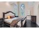 Main bedroom featuring high ceilings, large windows, and neutral decor at 9909 Moon Valley Pl, Las Vegas, NV 89134