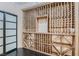 Custom wine cellar with wooden racks and a climate controlled system at 9909 Moon Valley Pl, Las Vegas, NV 89134