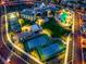 Aerial view of community center featuring tennis courts, bocce ball, community building, and a pool at 10096 Amethyst Hills St, Las Vegas, NV 89148