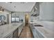 Bright kitchen featuring stainless steel appliances, large island, and modern design at 10096 Amethyst Hills St, Las Vegas, NV 89148