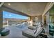 Outdoor pool with sun loungers, BBQ, and beautiful mountain views from the patio at 10096 Amethyst Hills St, Las Vegas, NV 89148