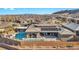 Backyard showcasing a pool, spa, and covered outdoor living space at 10096 Amethyst Hills St, Las Vegas, NV 89148