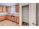 Kitchen with stainless steel dishwasher and open pantry for storage at 10418 Poplar Park, Las Vegas, NV 89166