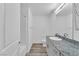 Bathroom showcasing a granite countertop vanity, tiled shower, and modern fixtures for a comfortable experience at 12305 Crimson Horizon Rd # 4, Las Vegas, NV 89183