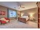 Bedroom featuring neutral walls, soft carpet, ceiling fan and a full size bed at 12356 Grey Dunes Ave, Las Vegas, NV 89138