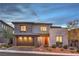 Contemporary two-story home with a two-car garage and manicured front yard at 12356 Grey Dunes Ave, Las Vegas, NV 89138