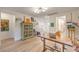Upstairs office featuring hardwood floors, modern lighting, and an eclectic decor at 12356 Grey Dunes Ave, Las Vegas, NV 89138