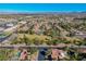 Community offering mature landscaping, walking paths, and a large grassy park for outdoor enjoyment at 1561 Doran Dr, Las Vegas, NV 89123