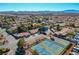 Overview of a residential neighborhood showcasing community tennis and basketball courts and mature landscaping at 1561 Doran Dr, Las Vegas, NV 89123