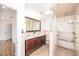 Well-appointed bathroom with double vanity, walk-in shower, and elegant tile work at 1561 Doran Dr, Las Vegas, NV 89123