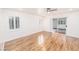 Bright bedroom with hardwood floors, ample natural light, and sliding glass door to the outside at 1561 Doran Dr, Las Vegas, NV 89123