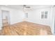 Bright bedroom features hardwood floors, shuttered windows, and an en-suite bathroom at 1561 Doran Dr, Las Vegas, NV 89123