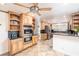 Spacious kitchen featuring stainless steel appliances, granite countertops, and custom cabinetry at 1561 Doran Dr, Las Vegas, NV 89123