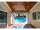 Back patio with wood ceiling and pool view at 1561 Doran Dr, Las Vegas, NV 89123
