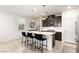 Stylish kitchen island with pendant lighting, bar stool seating, and modern fixtures at 1592 Pacific Baza St, Las Vegas, NV 89138