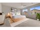 Serene bedroom with modern decor, large windows, and ample natural light at 201 White Mule Ave, Las Vegas, NV 89148
