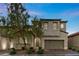 Charming two-story home with a well-manicured lawn and a spacious two-car garage in a desirable neighborhood at 201 White Mule Ave, Las Vegas, NV 89148