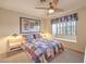 This cozy bedroom includes a window seat, fan, and accent lighting at 213 N Cimarron Rd, Las Vegas, NV 89145