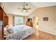Bedroom featuring hard wood floors and a ceiling fan at 213 N Cimarron Rd, Las Vegas, NV 89145