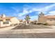 Street view of the community entrance showcasing well-maintained landscaping and inviting neighborhood ambiance at 213 N Cimarron Rd, Las Vegas, NV 89145