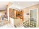 The kitchen features granite counters, mosaic backsplash and stainless steel appliances at 213 N Cimarron Rd, Las Vegas, NV 89145