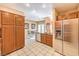 Bright kitchen with stainless steel appliances, ample storage, and adjacent dining area at 213 N Cimarron Rd, Las Vegas, NV 89145