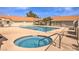 Community pool and spa area with a fenced perimeter, offering residents a refreshing and relaxing oasis at 213 N Cimarron Rd, Las Vegas, NV 89145