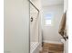 Clean bathroom featuring a shower with glass doors and a window at 2205 Santa Clara Dr, Las Vegas, NV 89104