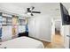 Bedroom featuring a TV, closet, and colorful curtains for a bright atmosphere at 2205 Santa Clara Dr, Las Vegas, NV 89104