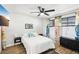 Comfortable bedroom with bright, decorative curtains, TV, and a large comfortable bed at 2205 Santa Clara Dr, Las Vegas, NV 89104