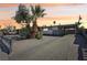 A charming single-story home with desert landscaping, a covered carport and ample parking at 2205 Santa Clara Dr, Las Vegas, NV 89104