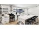 Well-equipped kitchen with stainless steel appliances, ample counter space, and modern floating shelves at 2205 Santa Clara Dr, Las Vegas, NV 89104