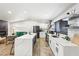 Modern kitchen with white cabinets, stainless steel appliances, and a spacious kitchen island at 2205 Santa Clara Dr, Las Vegas, NV 89104