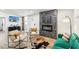 Inviting living room with modern fireplace, comfortable seating, and stylish decor at 2205 Santa Clara Dr, Las Vegas, NV 89104
