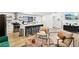 Open concept living space featuring a kitchen, dining area, and comfortable seating at 2205 Santa Clara Dr, Las Vegas, NV 89104