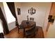 Charming dining area with a unique table and bench seating by the window at 230 E Flamingo Rd # 129, Las Vegas, NV 89169
