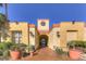 Inviting entrance with pathway to clubhouse and amenities at 230 E Flamingo Rd # 129, Las Vegas, NV 89169