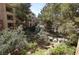 Lush greenery surrounds this condo providing a sense of serenity at 230 E Flamingo Rd # 129, Las Vegas, NV 89169