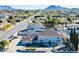 Aerial view of the property showing its layout, landscaping, and the neighborhood at 241 E Country Club Dr, Henderson, NV 89015