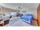 Another bedroom view with a desk, bed, and closet space at 241 E Country Club Dr, Henderson, NV 89015