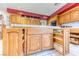 Kitchen island with convenient slide-out storage solutions for organization and accessibility at 241 E Country Club Dr, Henderson, NV 89015
