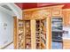 Spacious pantry in the kitchen with pull-out shelves for organized and easy storage at 241 E Country Club Dr, Henderson, NV 89015