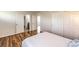 Bedroom with hardwood floors and a closet as well as access to other rooms at 2653 Rimbaud St, Henderson, NV 89044